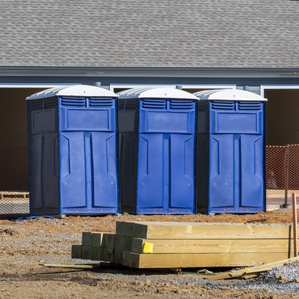 how often are the portable restrooms cleaned and serviced during a rental period in Luna Pier MI